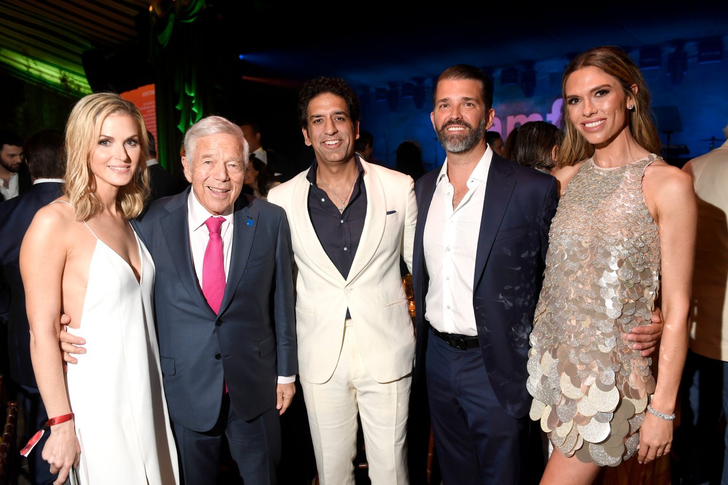 Dana Blumberg, Robert Kraft, Omeed Malik,, Donald Trump Jr., and Bettina Anderson attend amfAR Palm Beach Gala