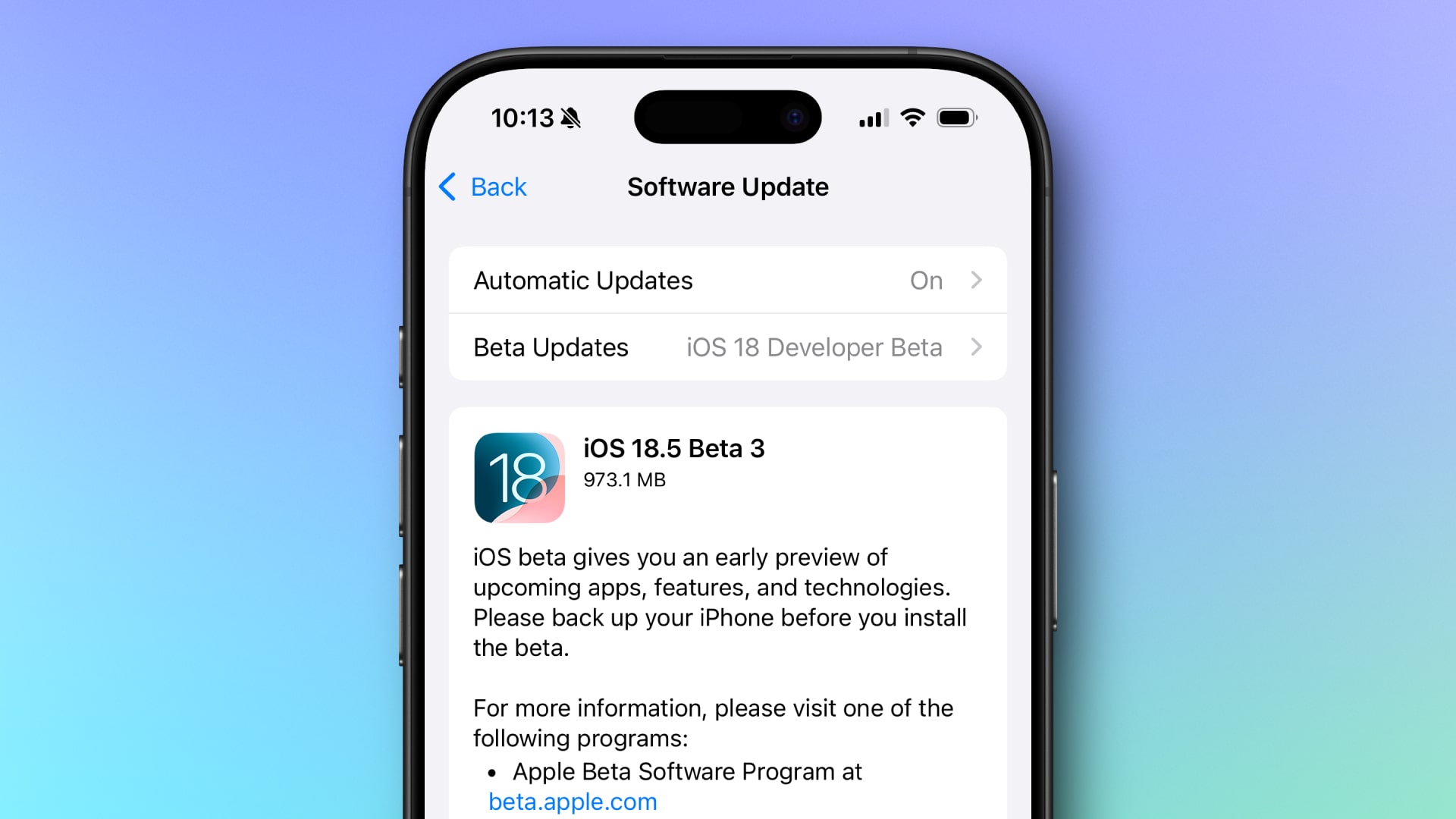 An iPhone 16 Pro showing the download screen for iOS 18.5 beta 3.