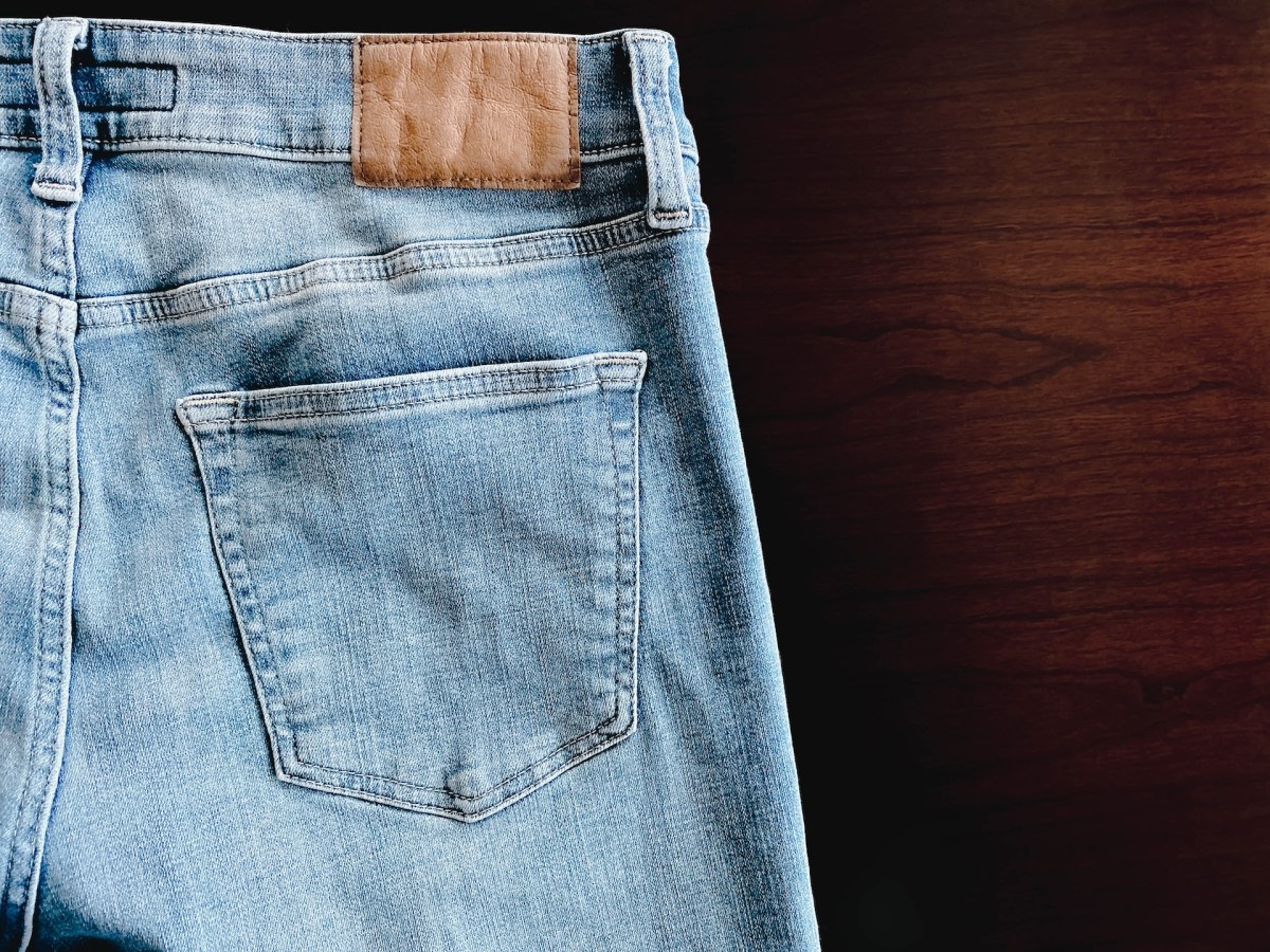 Close-up of back pocket on blue jeans