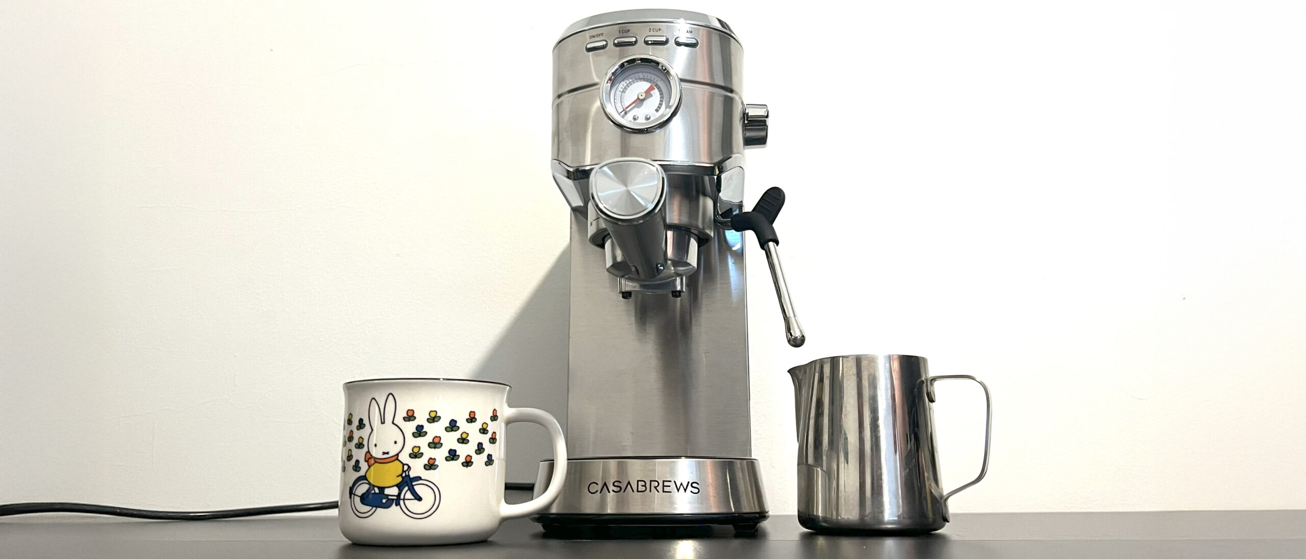 Casabrews CM5418 on kitchen counter with mug and milk jug