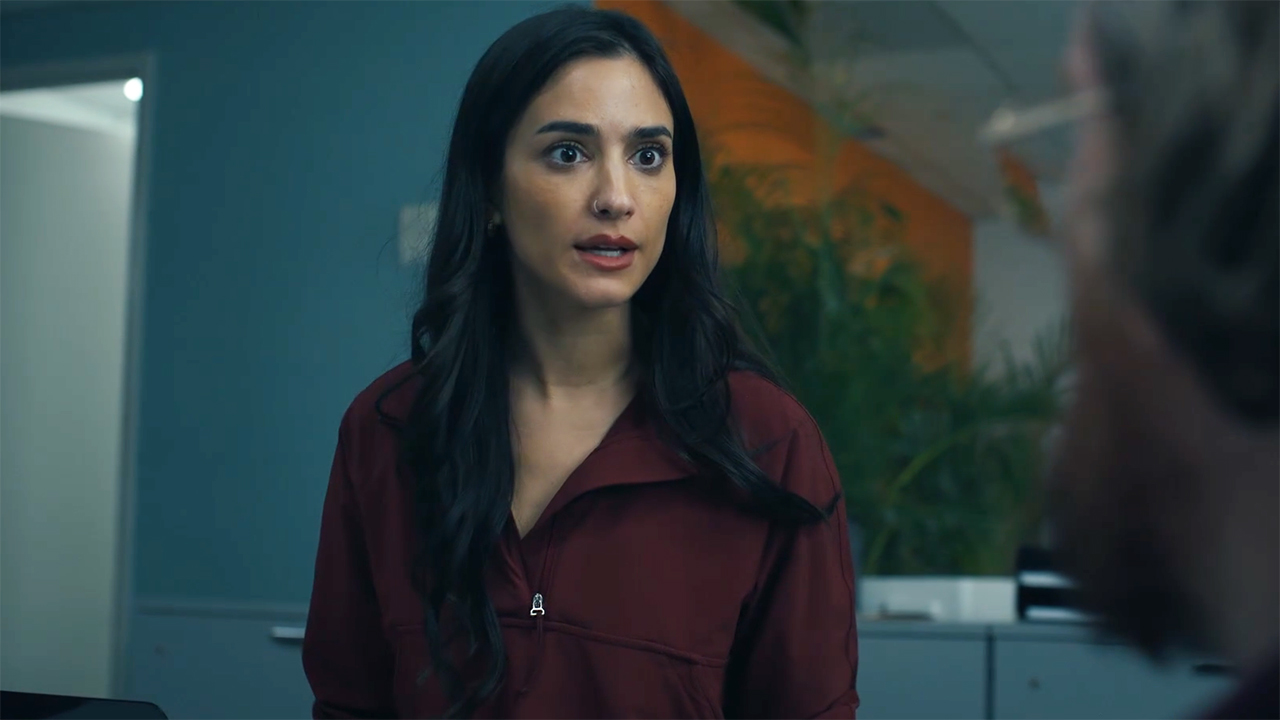 Sasha Bordeaux looking at an off-camera John Economos in Peacemaker season 2 episode 5