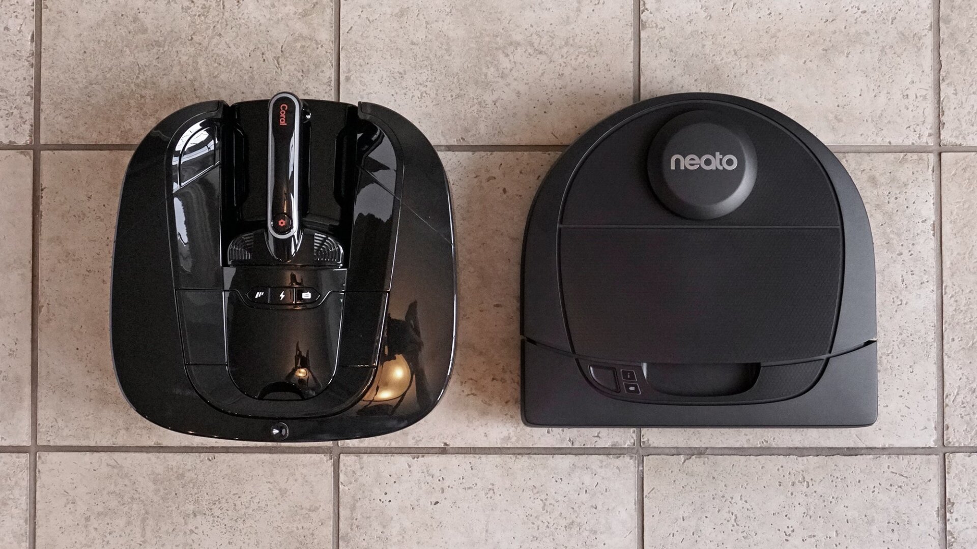 The Coral One (left) has roughly the same footprint as the Neato D4 (right).