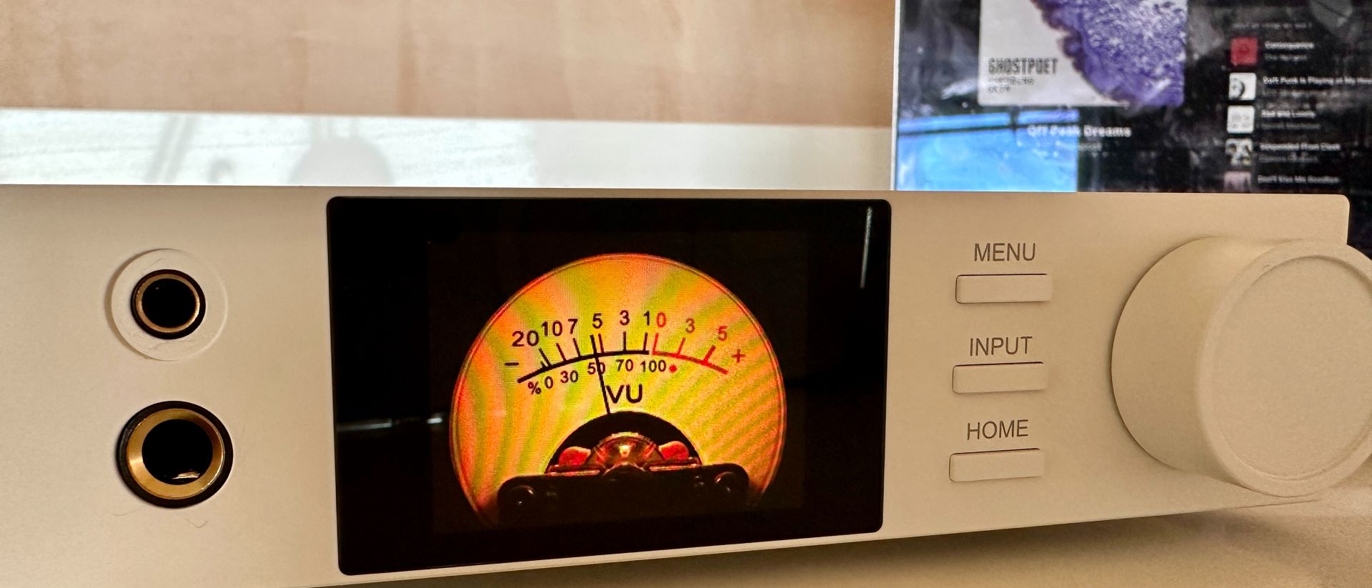 Topping DX5 II on a light-wood table