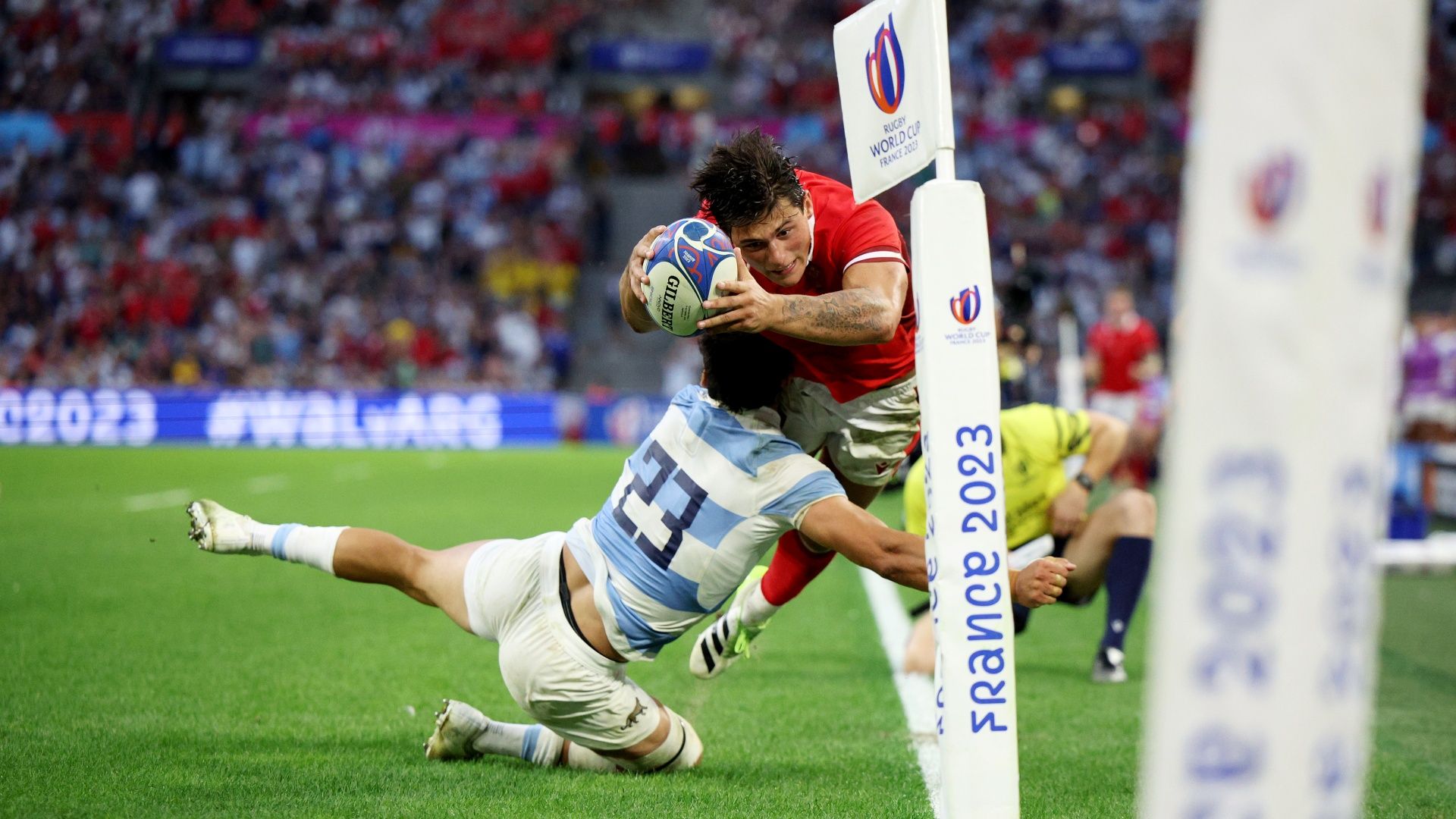 Louis Rees-Zammit being tackled by Matias Moroni during the Wales vs Argentina clash at the 2023 Rugby World Cup