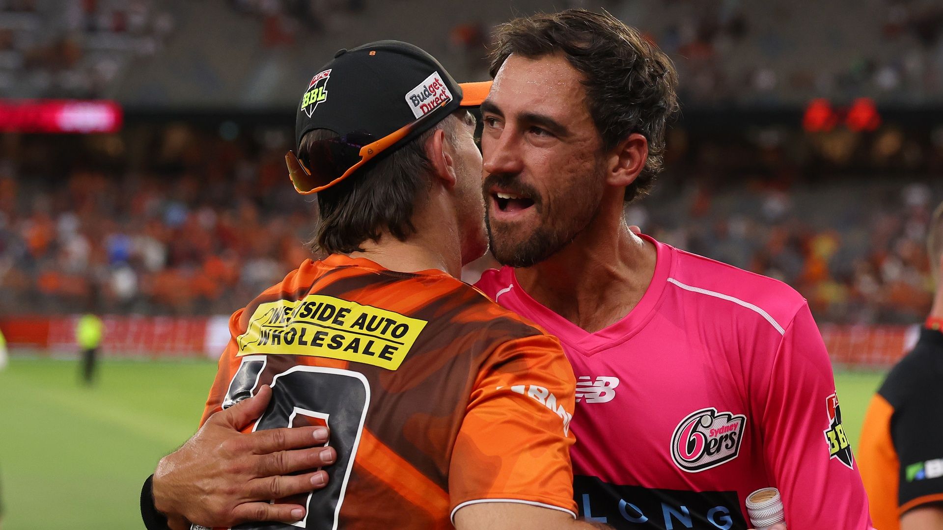 Mitchell Marsh of the Scorchers Mitchell Starc of the Sixers embrace ahead of the 2026 BBL Final